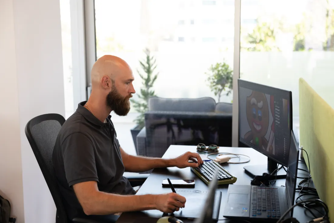 An artist shaping a LUDUS character on screen